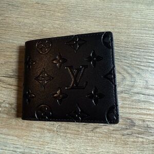 Black embossed leather wallet